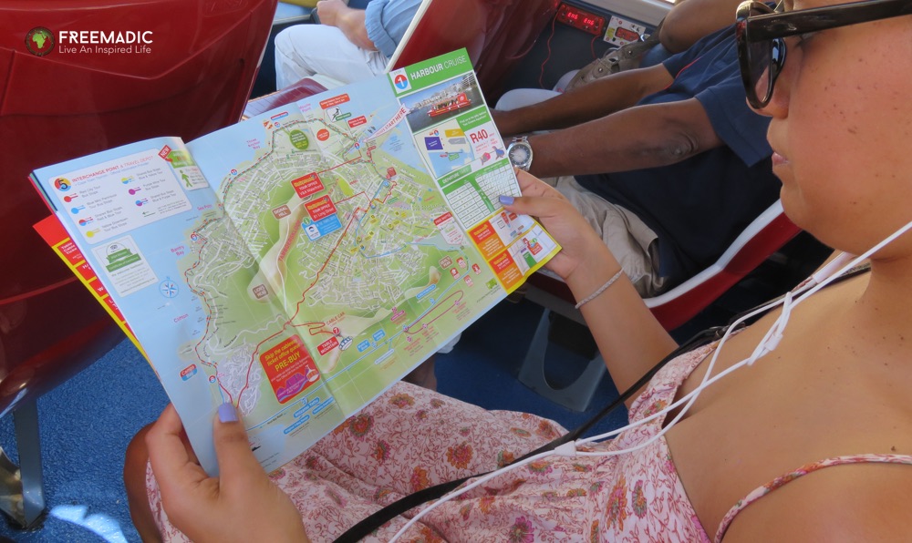 freemadic_cape_town_citysightseeing_bus_lara_reading_map